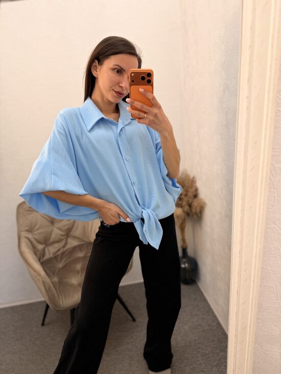 Blūze ar balona tipa rokām.